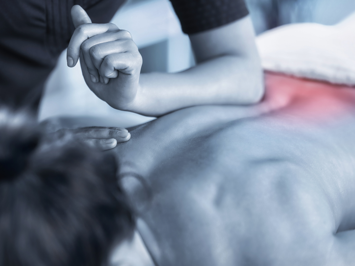 image of person receiving an upper back massage